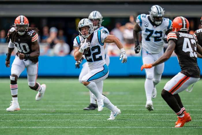 Charlotte, North Carolina, USA; Carolina Panthers running back Christian McCaffrey (22) breaks into open field during the second half against the Cleveland Browns at Bank of America Stadium.